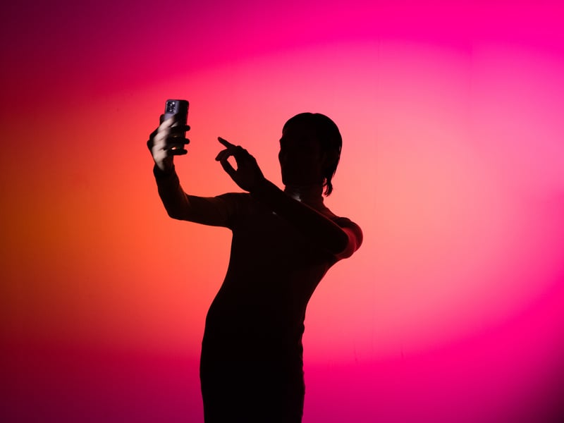 Holo AI Silhouette of Person with Smartphone